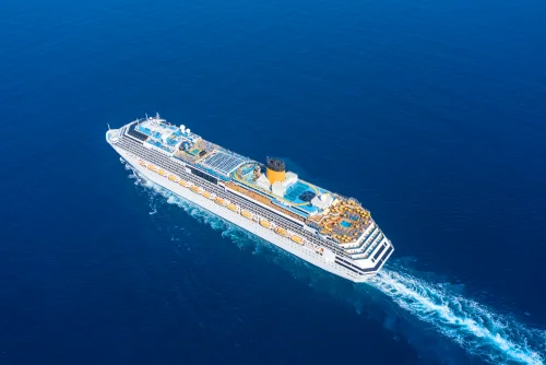 cruise-ship-liner-sails-blue-sea-leaving-plume-surface-water-seascape-aerial-view-concept-sea-travel-cruises