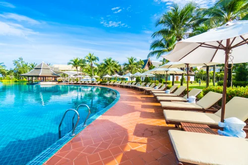 hammocks-umbrella-placed-near-large-pool